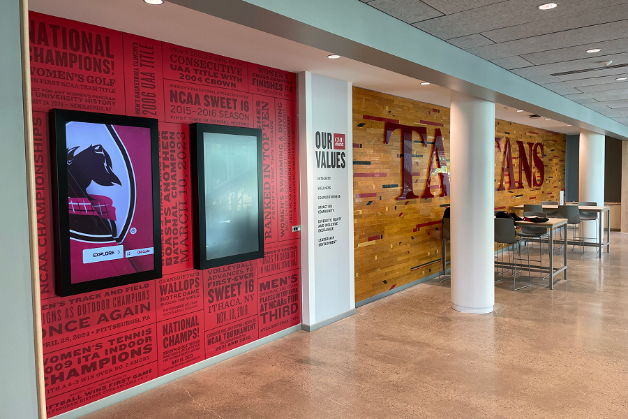 Inside wall of the Highmark Center showing CMU branding
